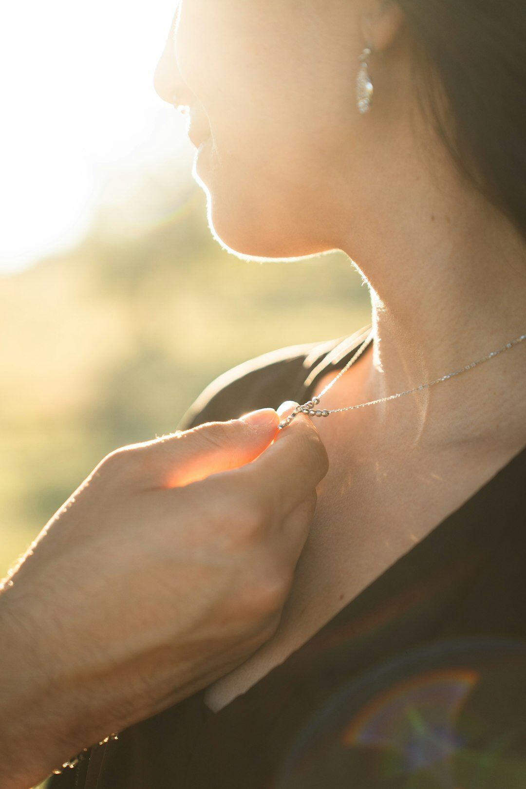 woman wearing diamond necklace